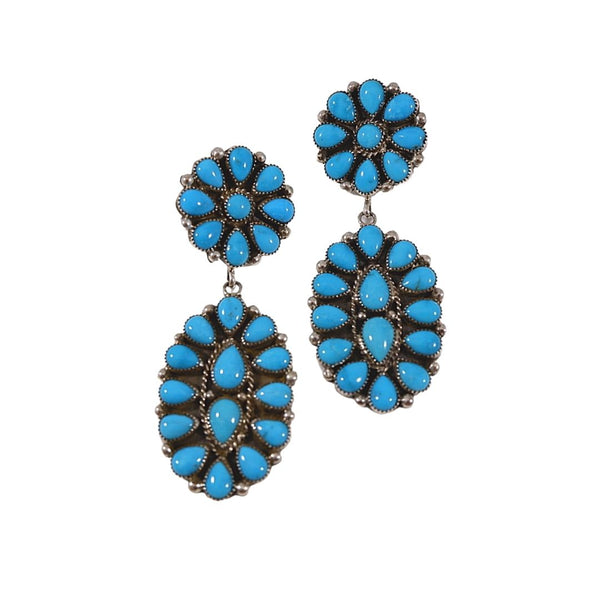 Sleeping Beauty Turquoise earrings set in sterling silver by American Indian Jewelry Artist: JH , Zuni 