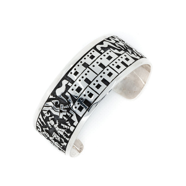 Traditional sterling silver overlay cuff bracelet made by Native American Indian Artist:  Darren Silas, Hopi. 