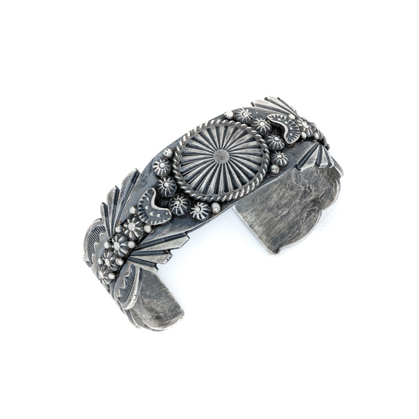 Traditional southwestern sterling silver stamped cuff bracelet. Native American Indian Artist: Jim Harrison, Navajo.