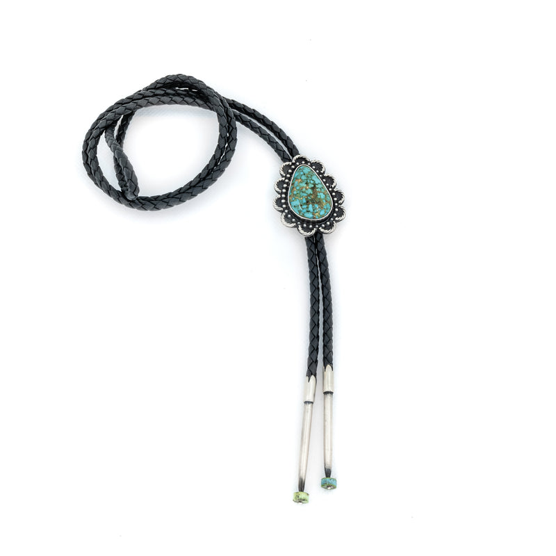Artist: Alex Horst. Sterling Silver, Kingman Turquoise and braided leather cord create stunning native american bolo tie.