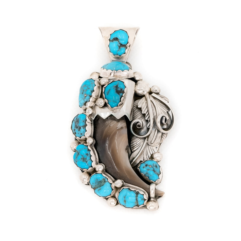 Authentic Sleeping Beauty Turquoise, Bear Claw and Sterling Silver pendant. Native American Artist: M Tsosie.
