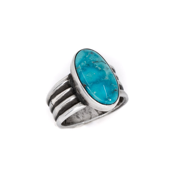 The stone is the star in this unique Kingman Turquoise sterling silver ring. American Indian Artist: Alex Horst 