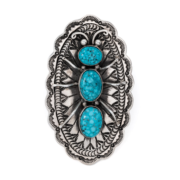 Renown American Indian Artist, Lee Charly Kingman Turquoise set in sterling silver is truly one-of-a-kind.