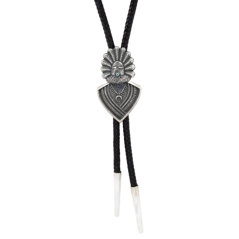 Bold and Unique Native American Indian sterling silver and Sleeping Beauty turquoise bolo tie on heavy braided leather cord. Artist: Jim Harrison, Navajo.