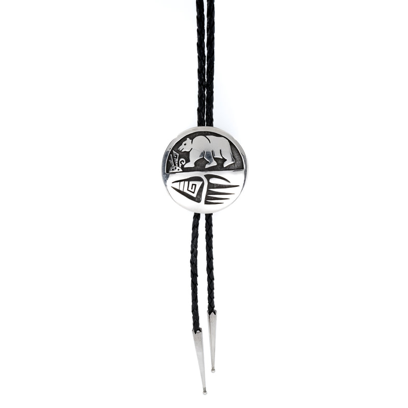 Traditional southwestern style 2" silver medallion bolo tie. Native American Indian Artist: Cyrus Josytewa, Hopi.