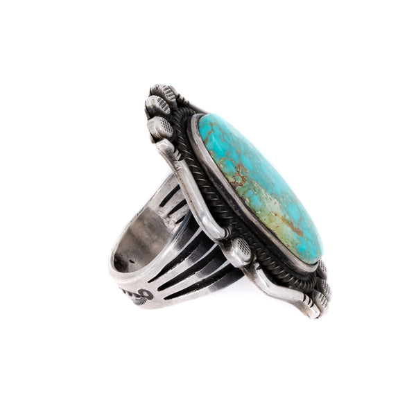 Quality Native American jewelry. Unique Turquoise Mountain Turquoise ring set in sterling silver. Artist: Calvin Martinez, Navajo. Profile pic..